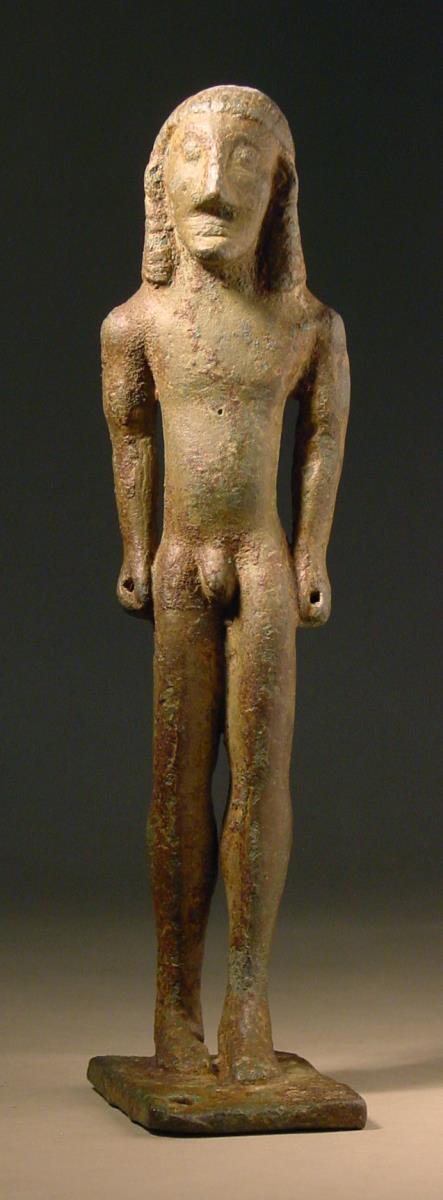 Archaische Statuette eines nackten, stehenden Jünglings