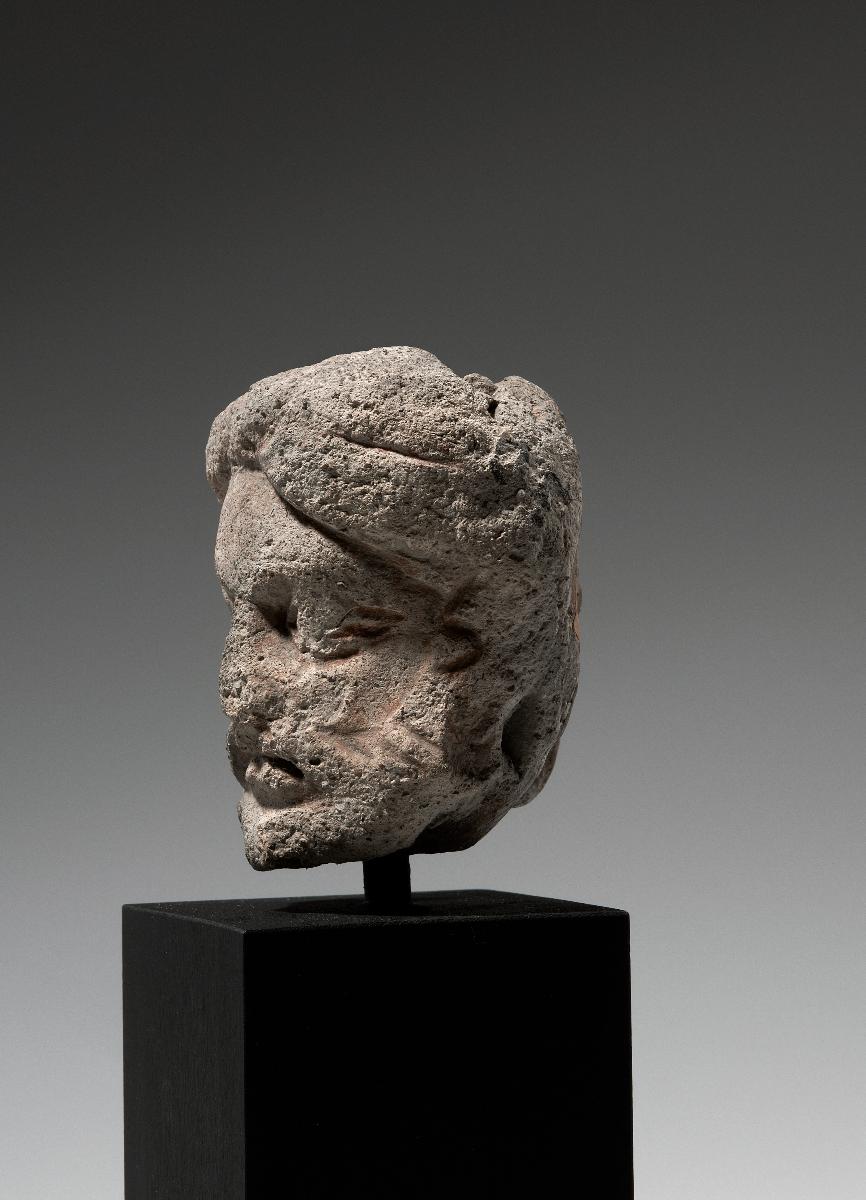Kopf eines Mannes mit Vollbart und Turban