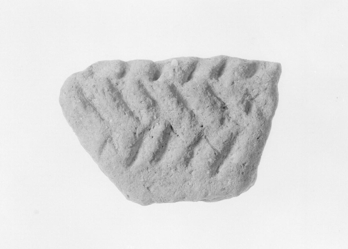 Verzierte Topfscherbe