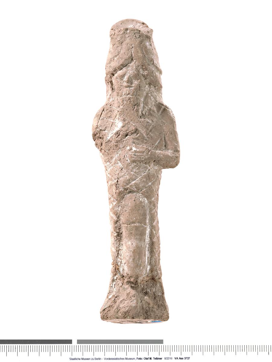 Statuette eines Mannes im Fisch-Gewand