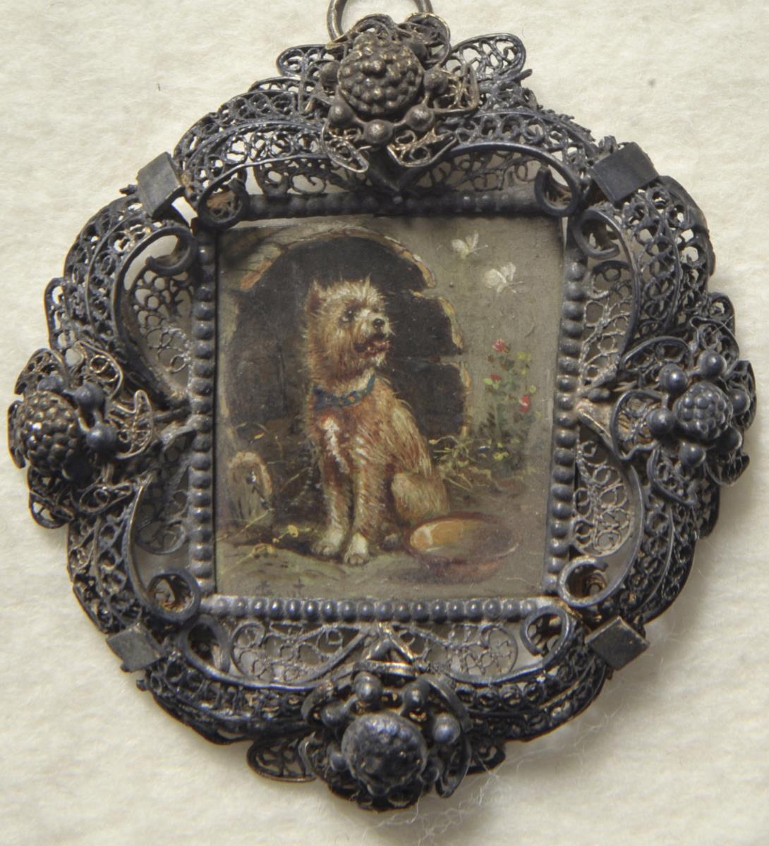 Hund vor einer Tonne. Miniatur aus der Sammlung Loewe