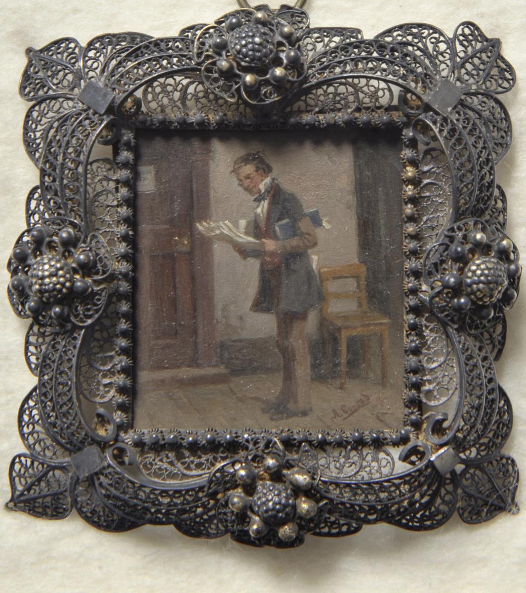Zeitung lesender Mann. Miniatur aus der Sammlung Loewe