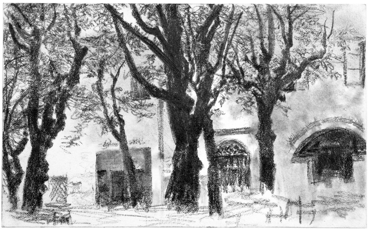 Baumbestandener Platz mit Biergarten in einer Ortschaft