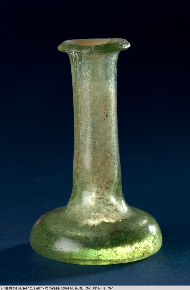 Kleines grüner Flakon