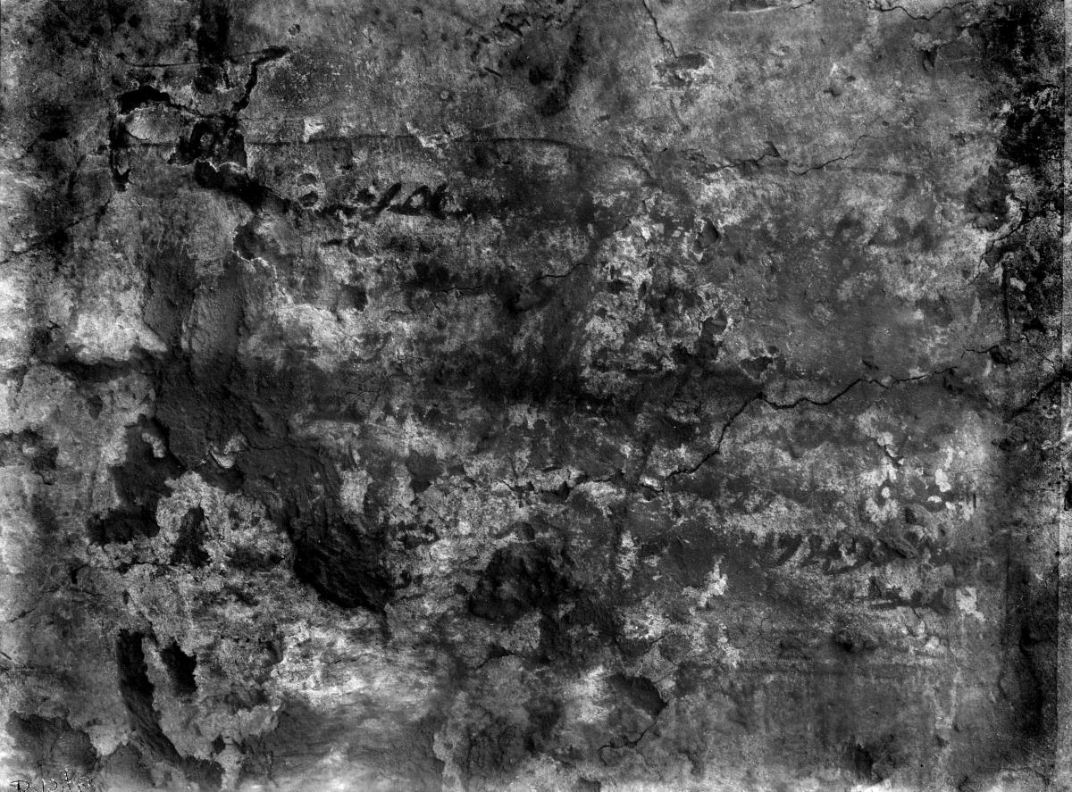 Wandmalerei und Inschrift
