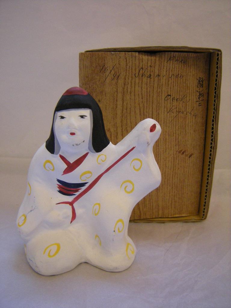 Frau mit Shamisen
