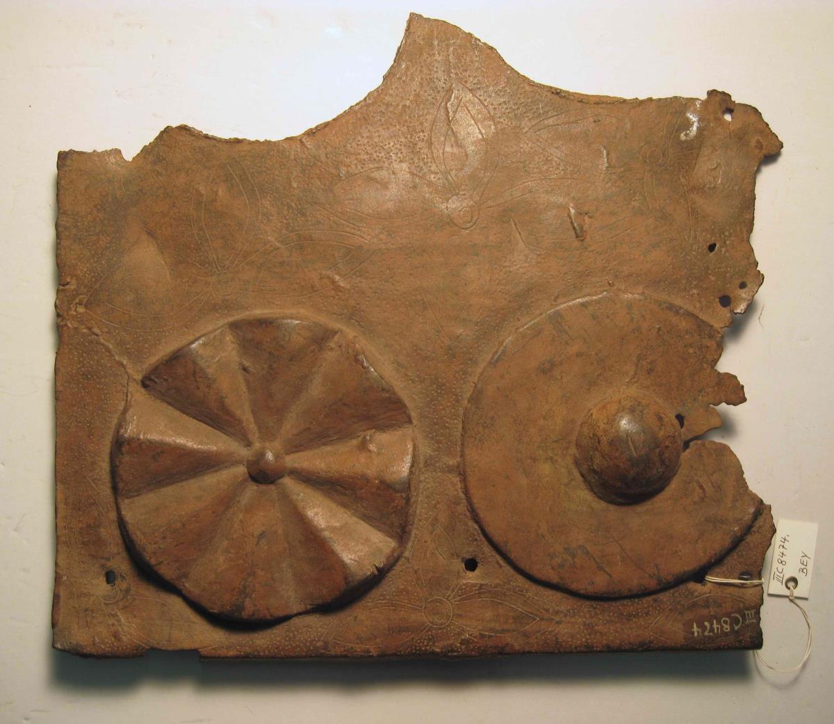 Rosette und Buckelförmige Scheibe