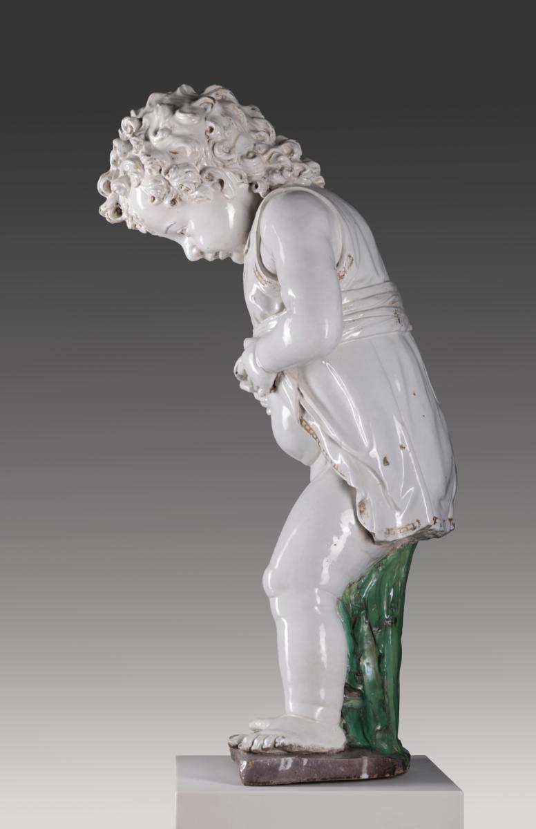 Pinkelnder Knabe als Brunnenfigur