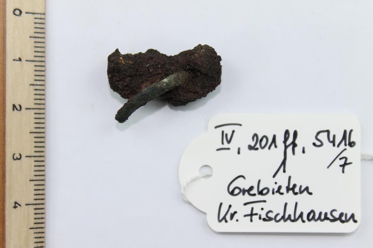 Bronze- und Eisenfragment
