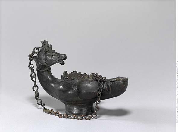 Lampe mit Pferdekopf am Griff