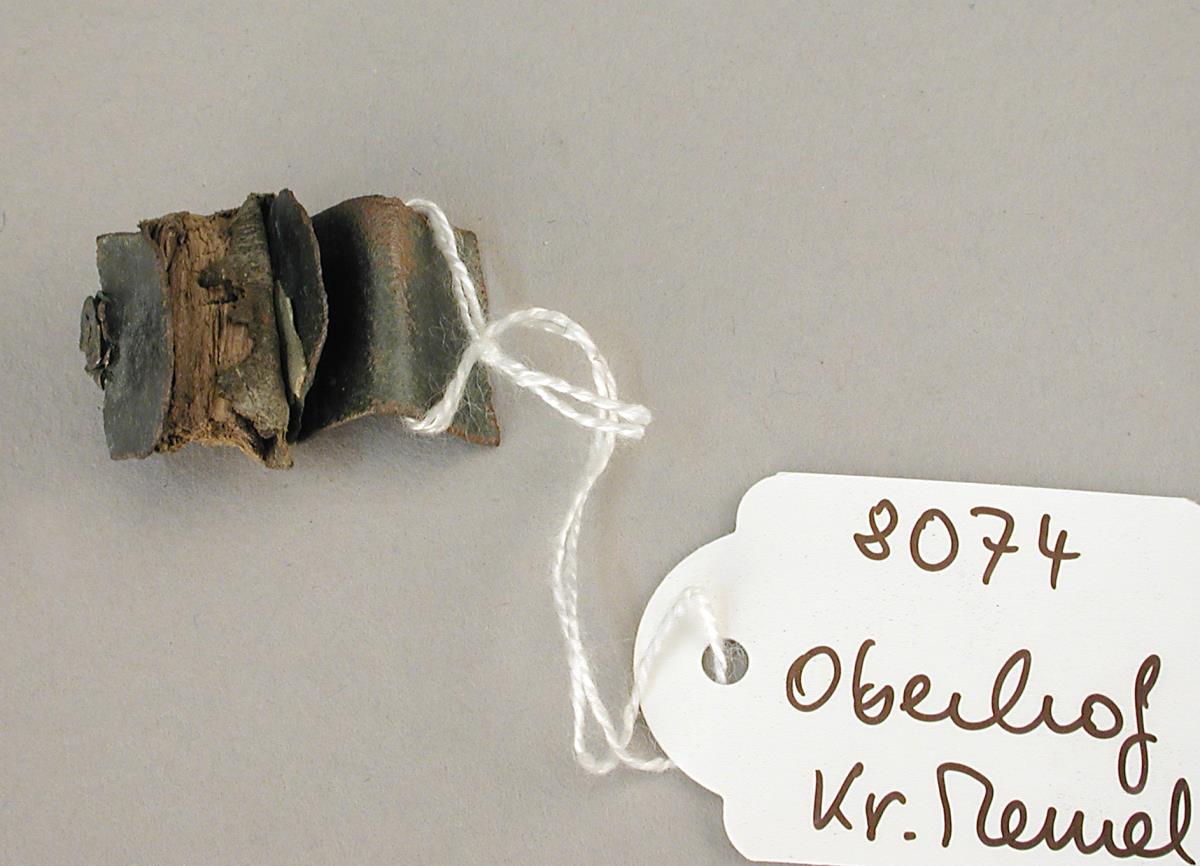 Bronzeblechfragment