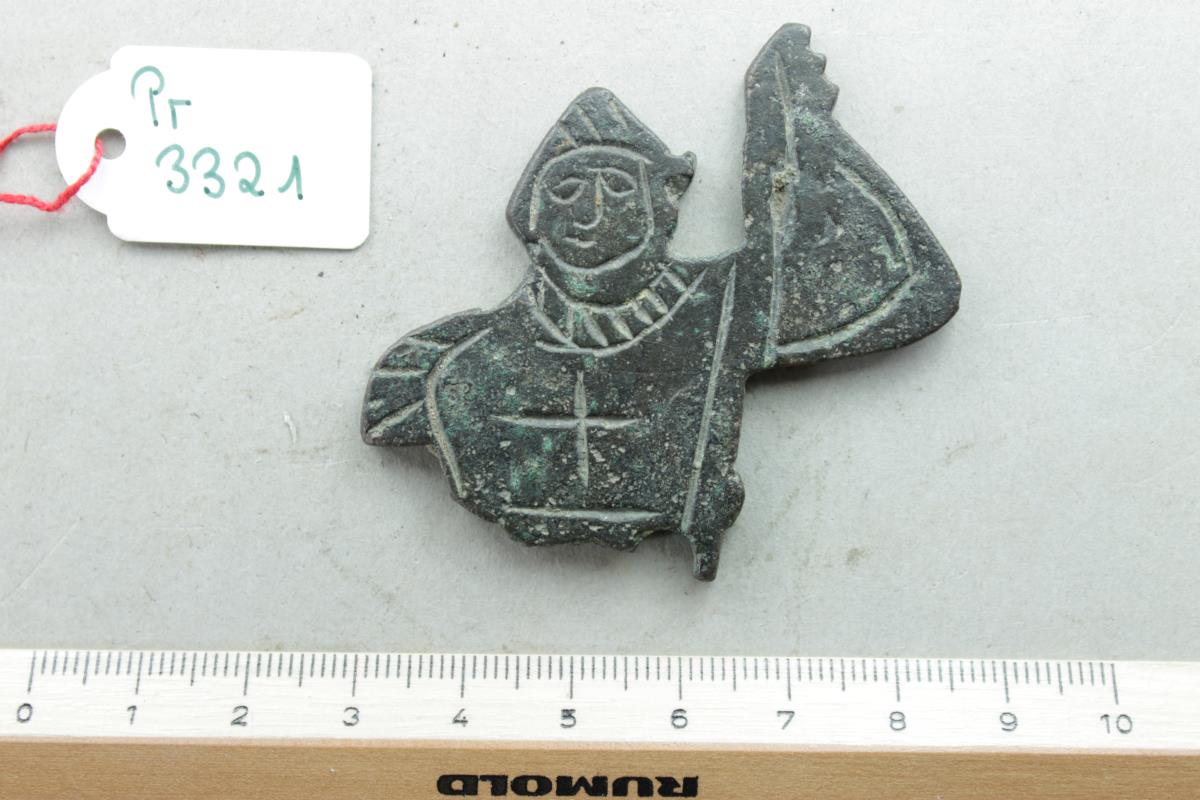Flache Bronzefigur