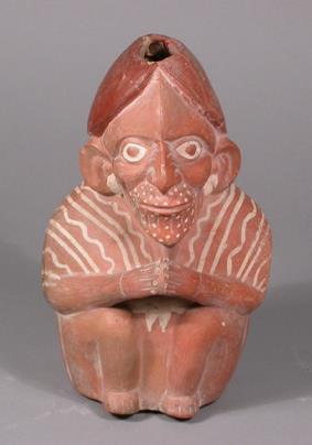 Sitzende anthropomorphe Figur mit einem Kopf in Penisform