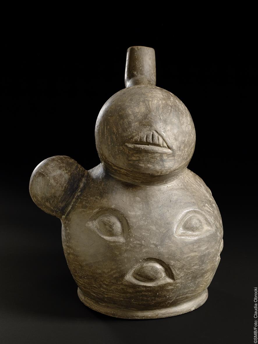 Knolle/Frucht mit anthropomorphem Kopf