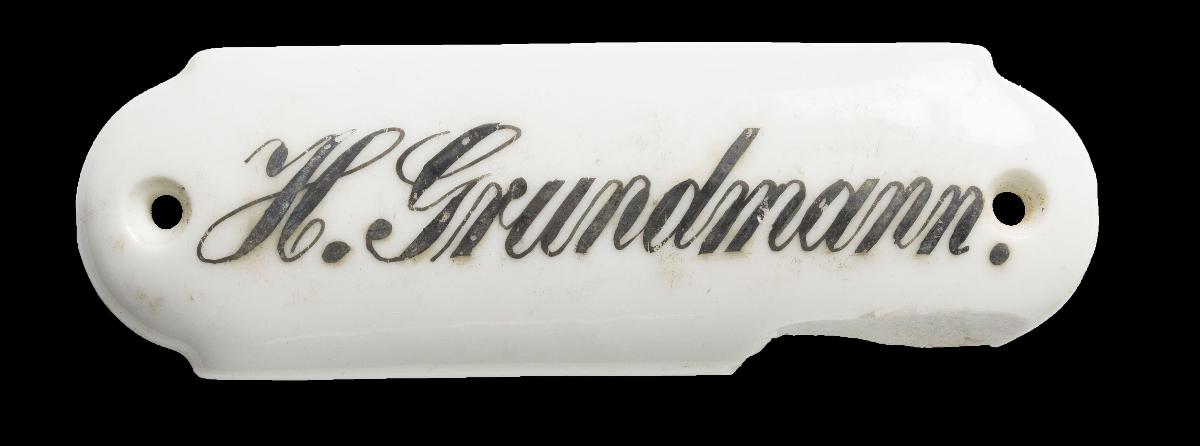 Namensschild "H. Grundmann."
