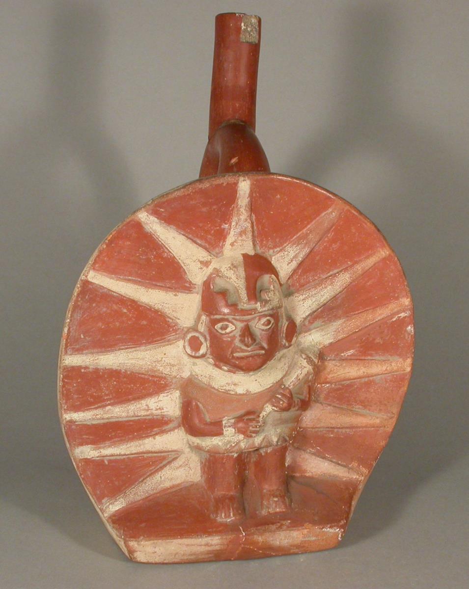 Relief: anthropo-zoomorphe Figur mit Strahlenkranz