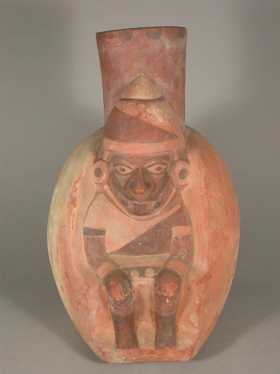 Relief: Sitzende anthropomorphe Figur
