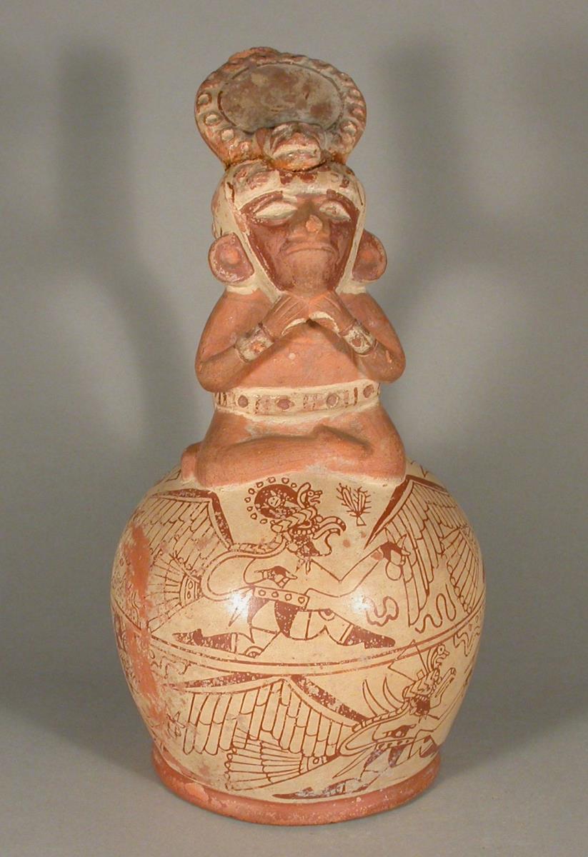 Applikation: sitzende anthropomorphe Figur; Fineline-Painting: laufende anthropo-zoomorphe Figuren
