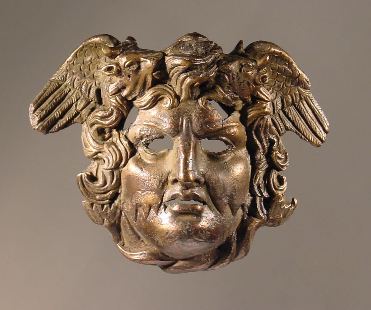 Applik in Form einer Tritonmaske (vielleicht Teil einer römischen Bronzestatue)