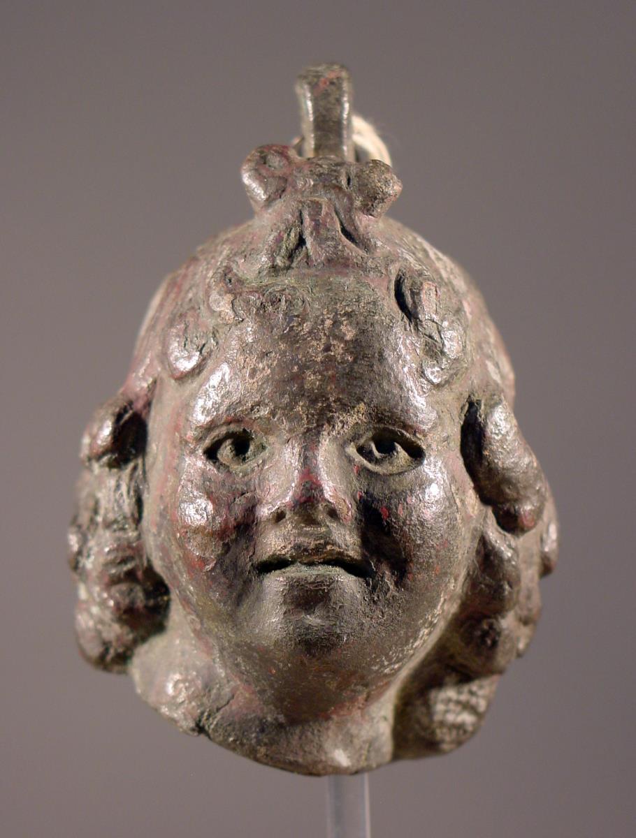 Laufgewicht in Gestalt eines Kinderkopfes (Fragment)