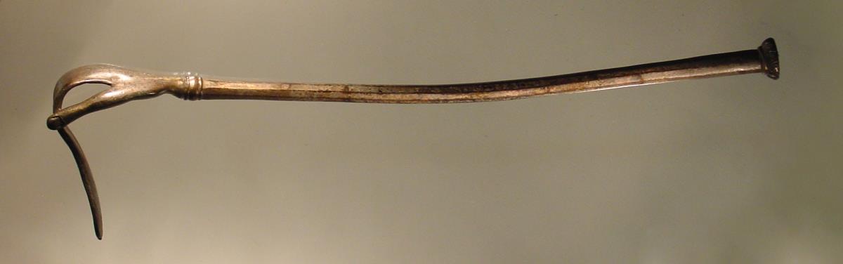 "Feuerschaufel". Schürhaken in Form einer Hand