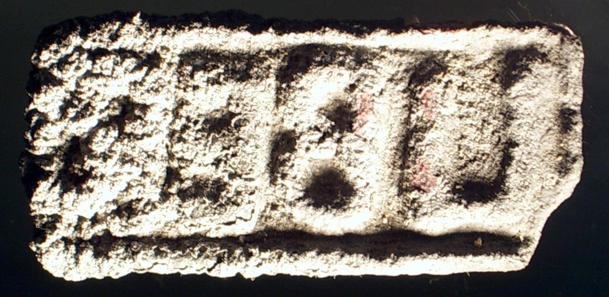 Rechteckiger Stempel mit lateinischer Inschrift: LIBER