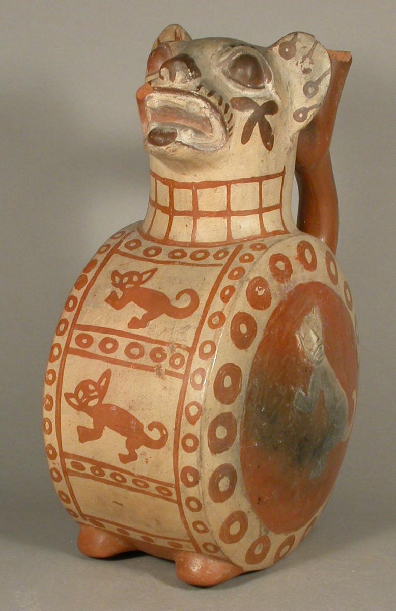 Applikation: Felidenkopf; Relief: Feliden
