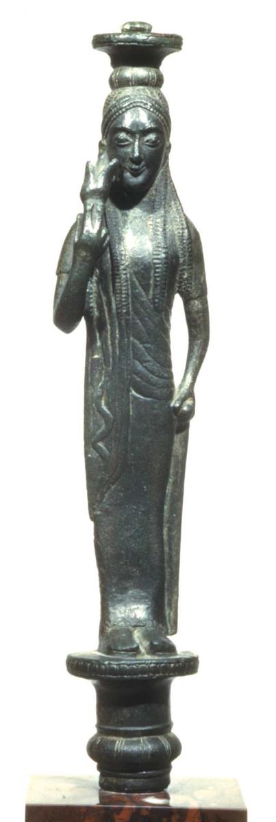 Gerätstütze: archaische Statuette