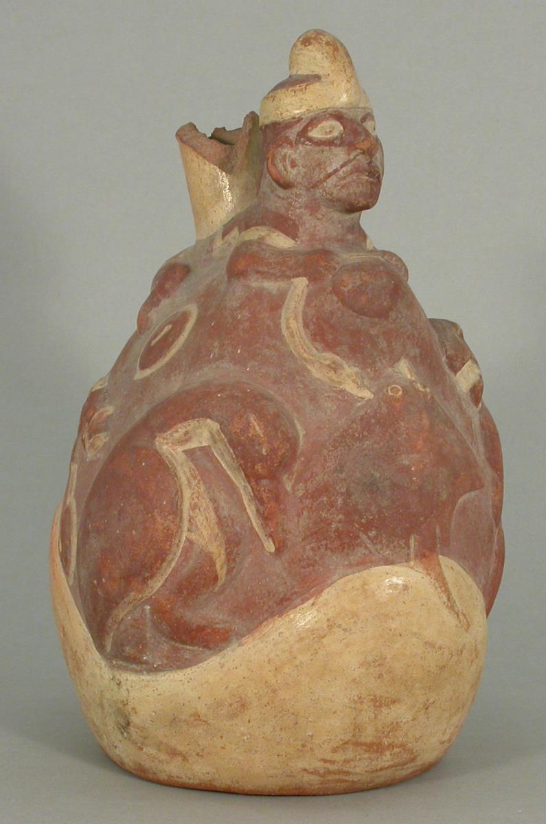 Applikation: anthropo-zoomorphe Figur; Relief: zoomorphe Figuren