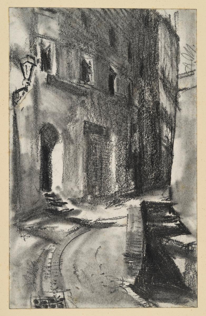 Nächtliche Straße im Laternenlicht