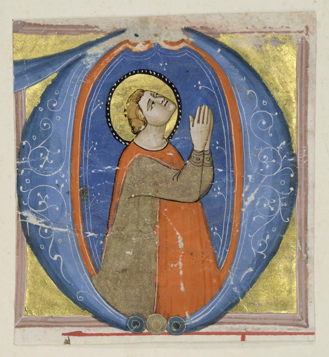 Initiale D mit der knienden Gestalt eines bartlosen Heiligen