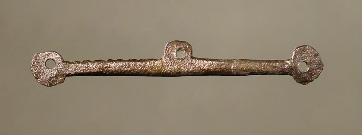 Kleiner Waagebalken (sog. Mithrassymbol)