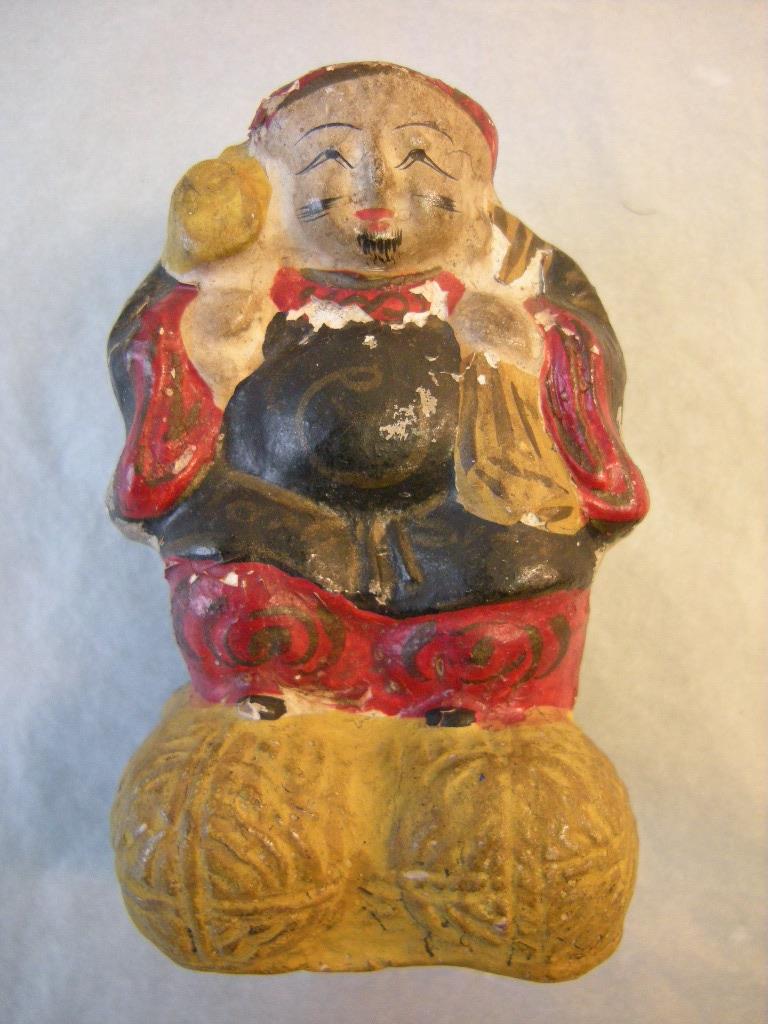 Glücksgott Daikoku 大黒 mit Reissäcken