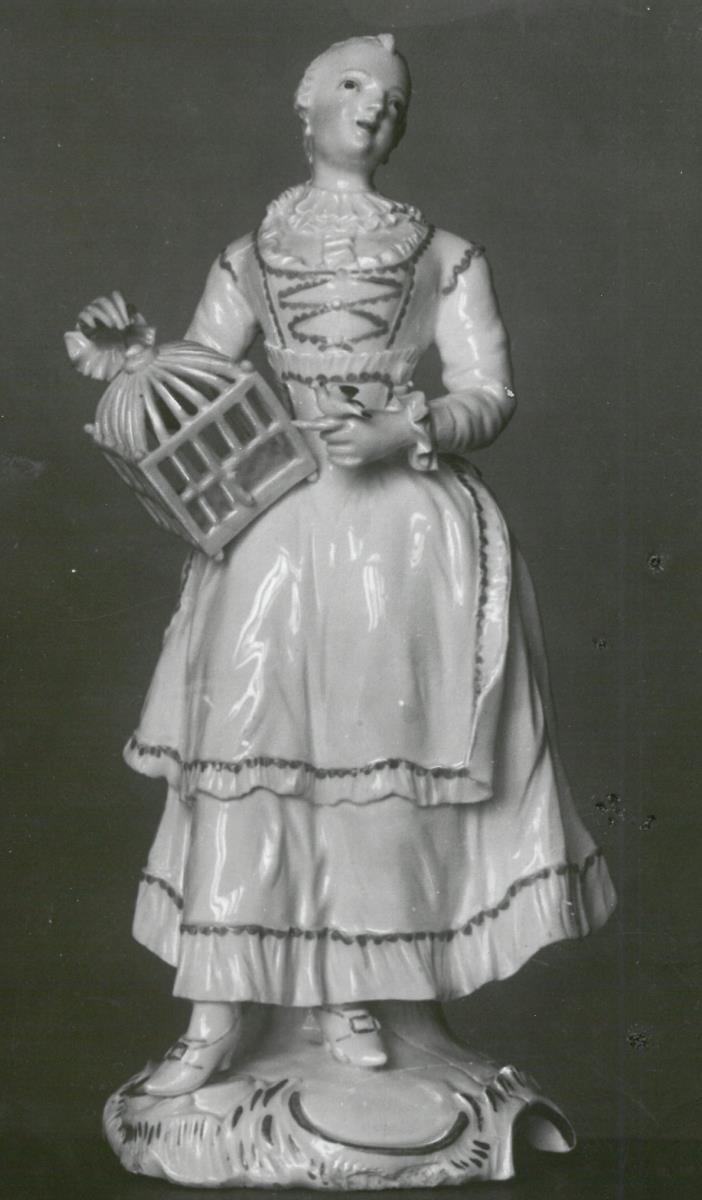 Dame mit Vogelkäfig