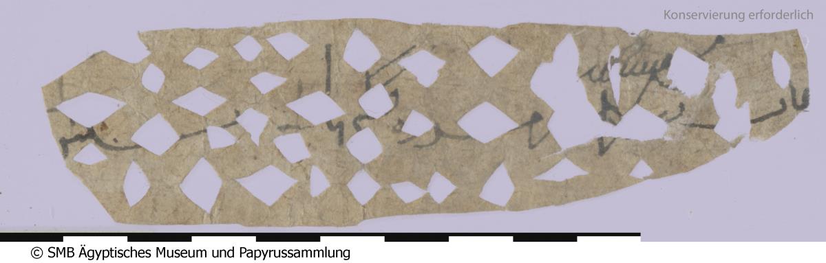 Arabisches Papier mit Liste mit griechischen Zahlen, aus dem kleine Muster herausgeschnitten wurden