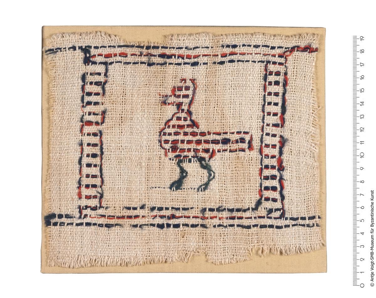 Gewebefragment mit Vogel