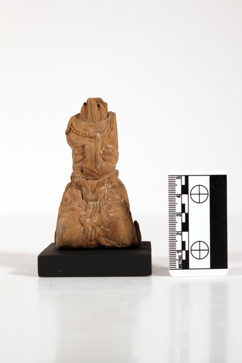 knieende kopflose Holzstatuette
