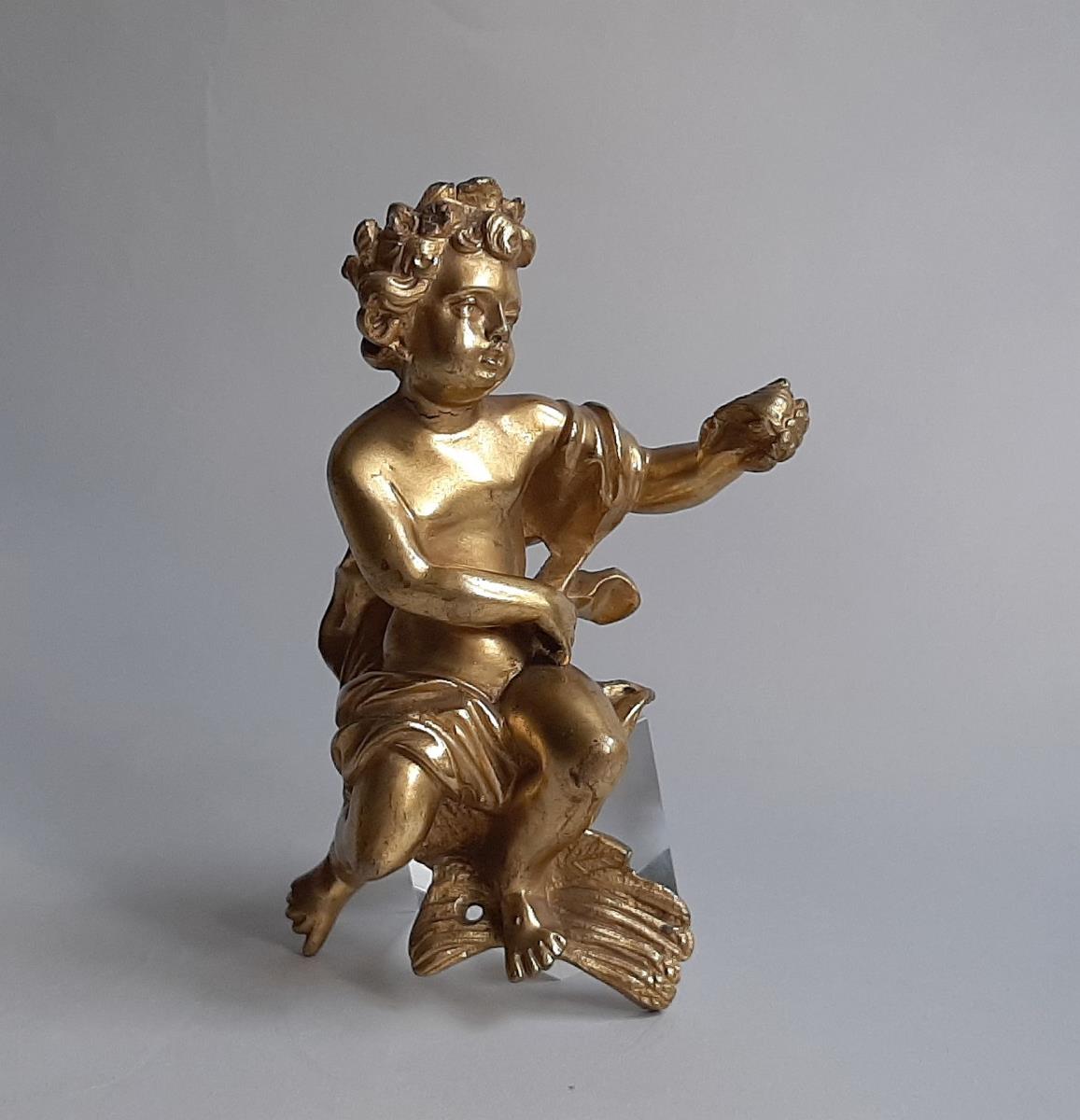 Aufsatzfigur in Gestalt eines Putto