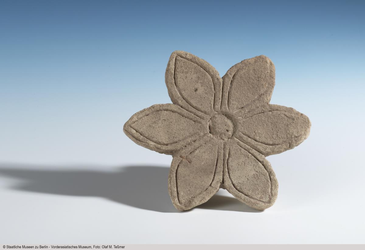 Einlage in Form einer Rosette