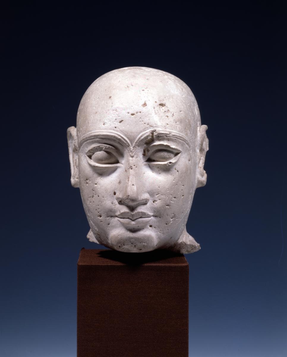Kopf einer Männerstatuette