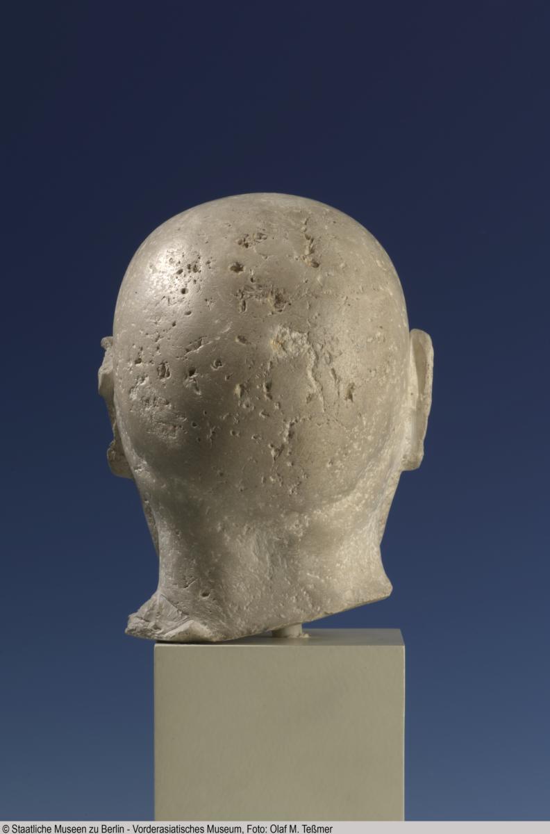 Kopf einer Männerstatuette