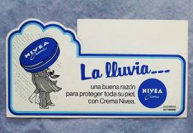Nivea-Creme: "La lluvia... una buena razón para proteger toda su piel, con Crema Nivea." - Im Regen - ein guter Grund um seine Haut mit Nivea Creme zu pflegen