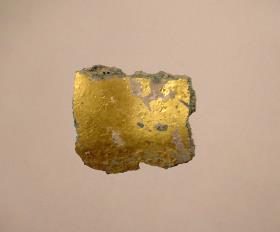 Vergoldetes Fragment einer Bronzestatue