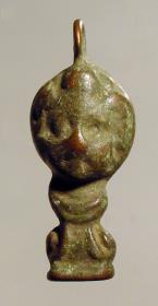 Attasche mit Kinderkopf